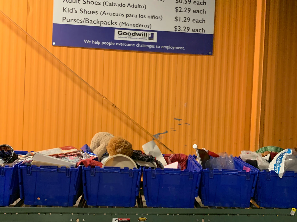 Goodwill Outlet Store in Oklahoma City, Oklahoma, highlighting organized racks of clothing near the checkout area.