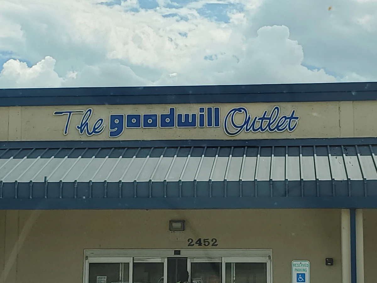 Goodwill Outlet Store in Dallas, Texas, a Goodwill outlet store showing blue rolling bins filled with discounted merchandise.