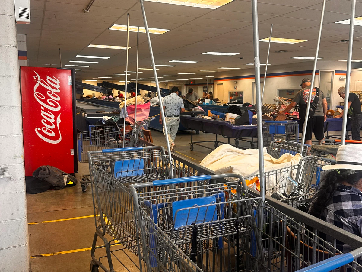 Goodwill Outlet Store in Pasco, Washington, displaying a large open layout with rows of donation bins.