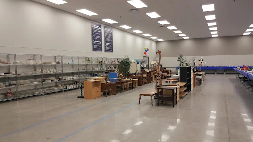 Goodwill Outlet in Milwaukee, Wisconsin, a Goodwill outlet store showing the donation entrance and bulk pricing signage.