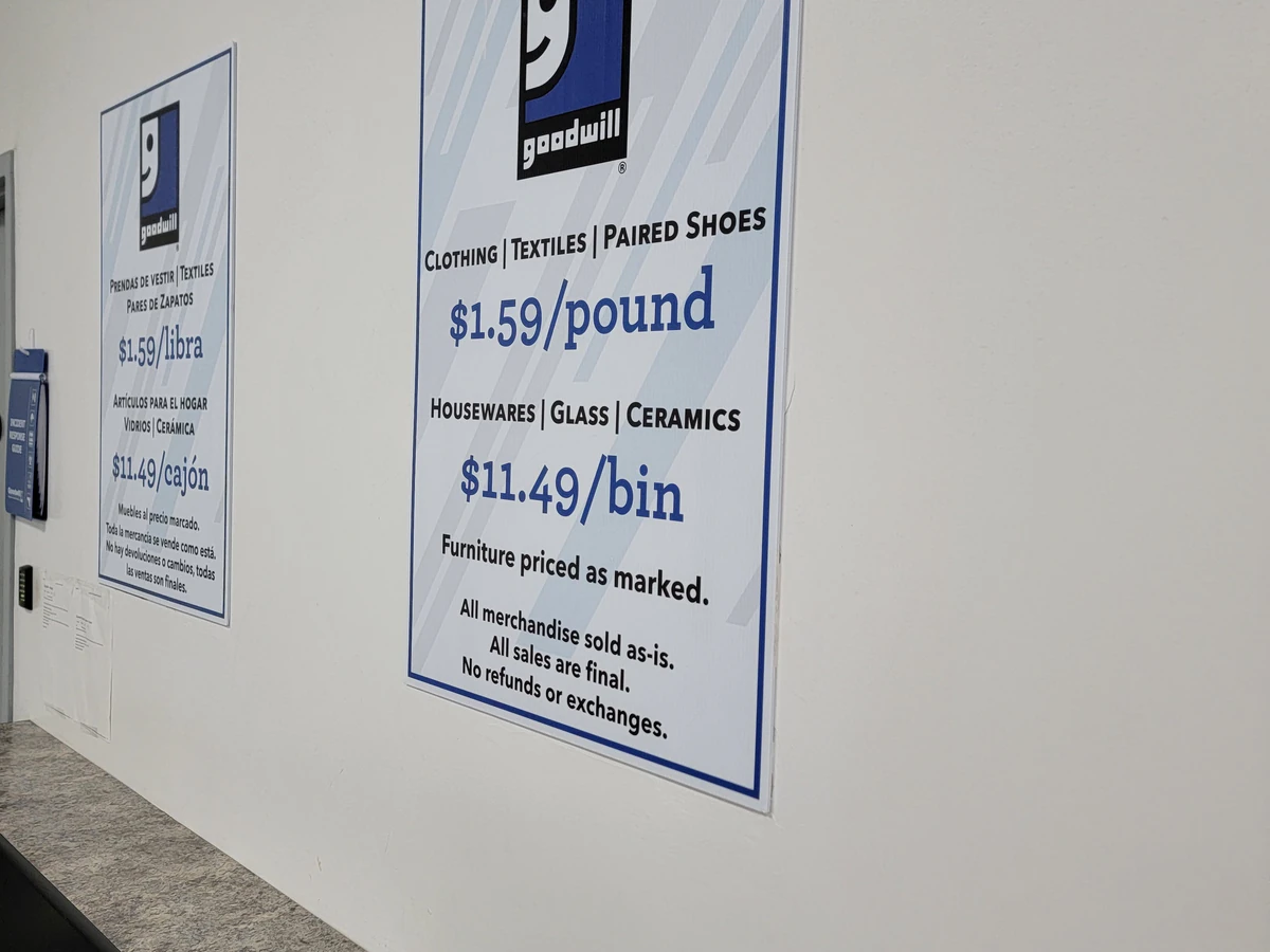 Goodwill - Pine Hills Outlet in Orlando, Florida, showing the donation entrance and bulk pricing signage.