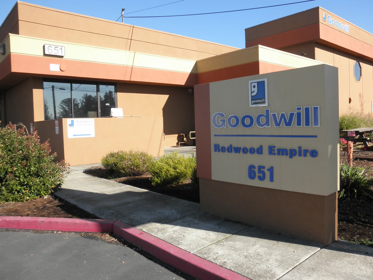 Goodwill Redwood Empire in Santa Rosa, California, showing neatly organized clothing racks and household goods.
