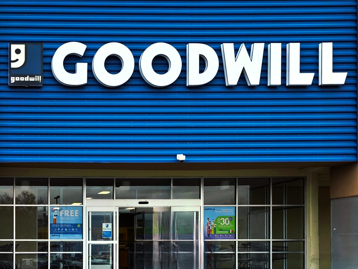 Goodwill- San Mateo in Albuquerque, New-mexico, showing neatly organized clothing racks and household goods.