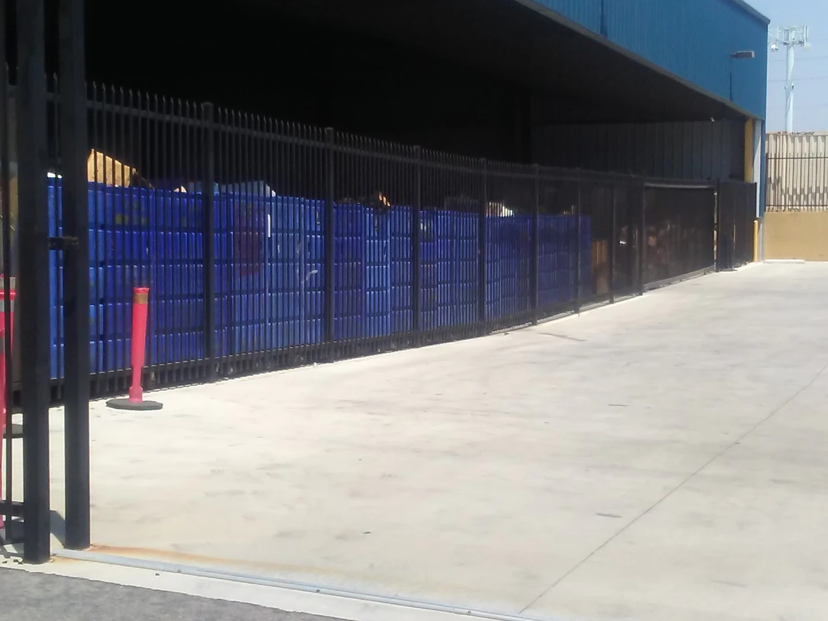 Goodwill Southern California Outlet Store in Los Angeles, California, showing the donation entrance and bulk pricing signage.