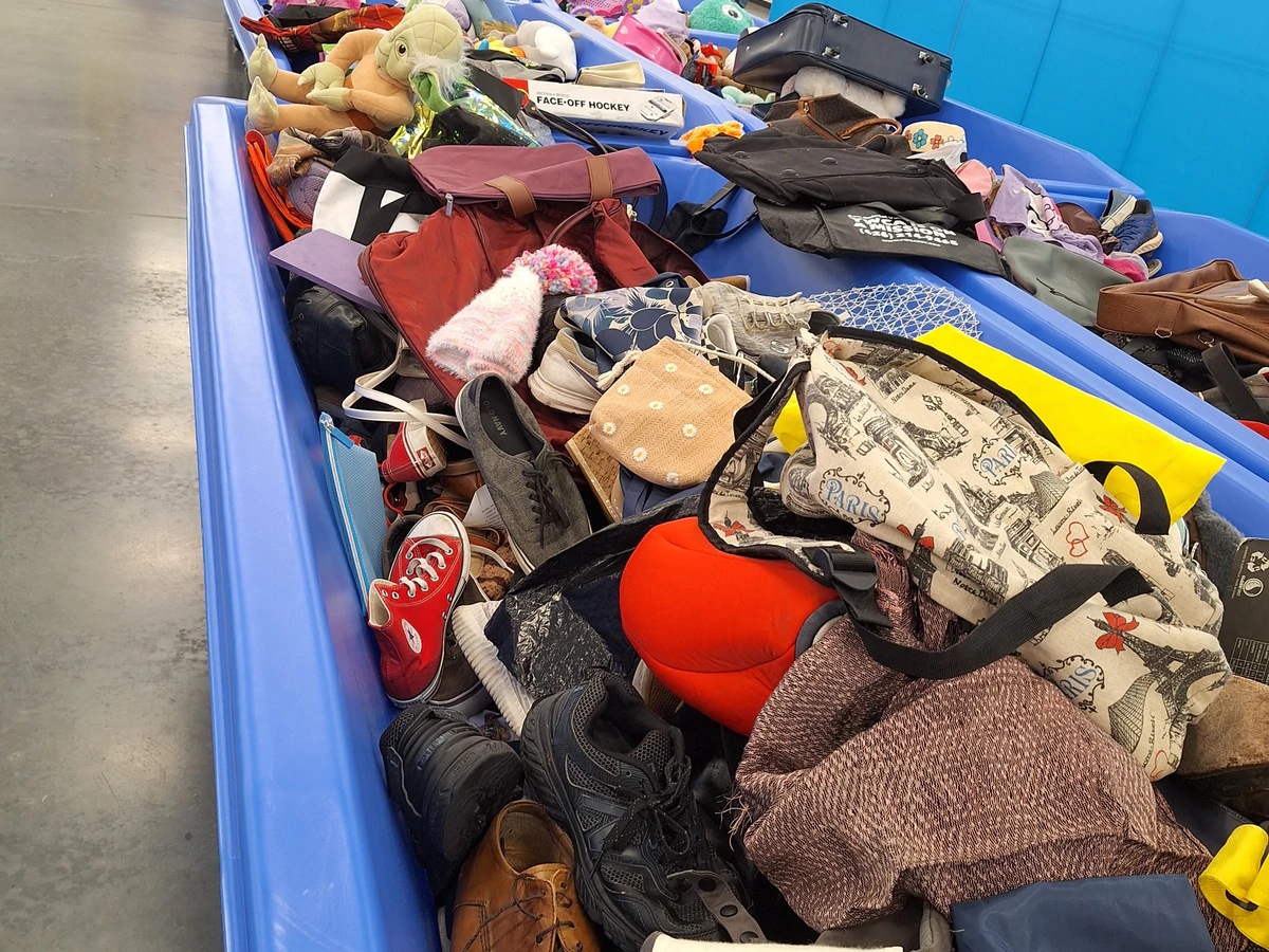 Goodwill Southern California Riverside Warehouse Clearance Center, a Goodwill thrift store showing rows of affordable footwe.