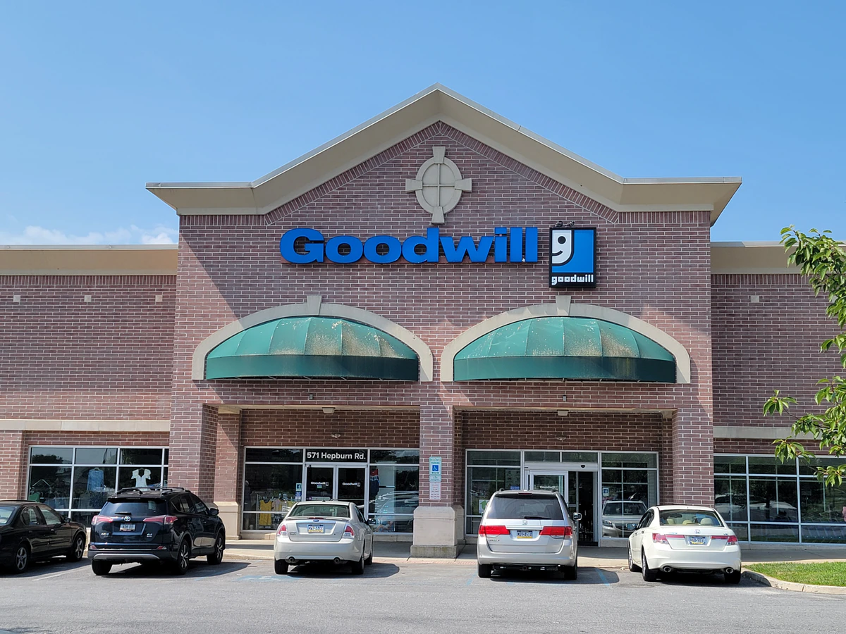 Goodwill Store & Donation Center in Avondale, Pennsylvania, showing neatly organized clothing racks and household goods.