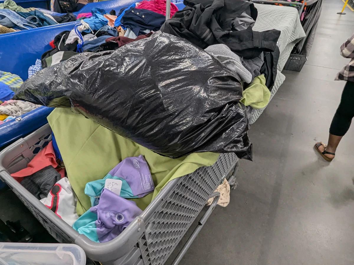 Goodwill - Taft Outlet in Orlando, Florida, displaying a large open layout with rows of donation bins.