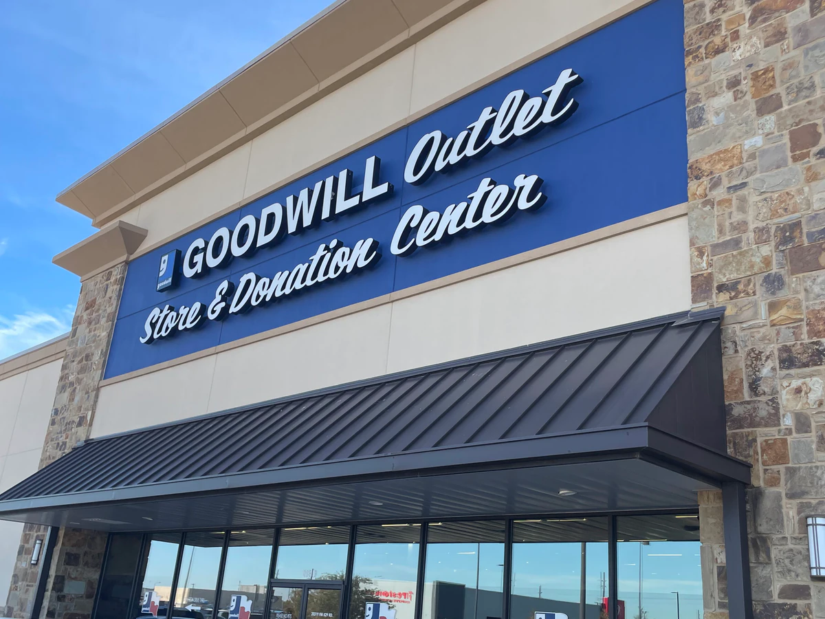 Goodwill Thrift Store - South Cypress in Katy, Texas, showing neatly organized clothing racks and household goods.