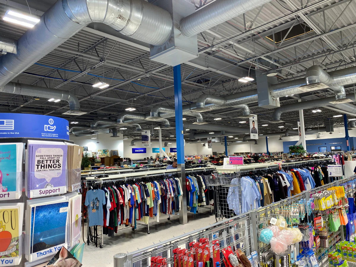 Goodwill Thrift Store - South Cypress in Katy, Texas, showing rows of affordable footwear and accessories for sale.