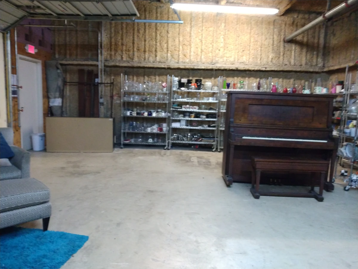 Heart of Texas Goodwill Industries in Harker Heights, Texas, featuring display shelves with books and home decor items.