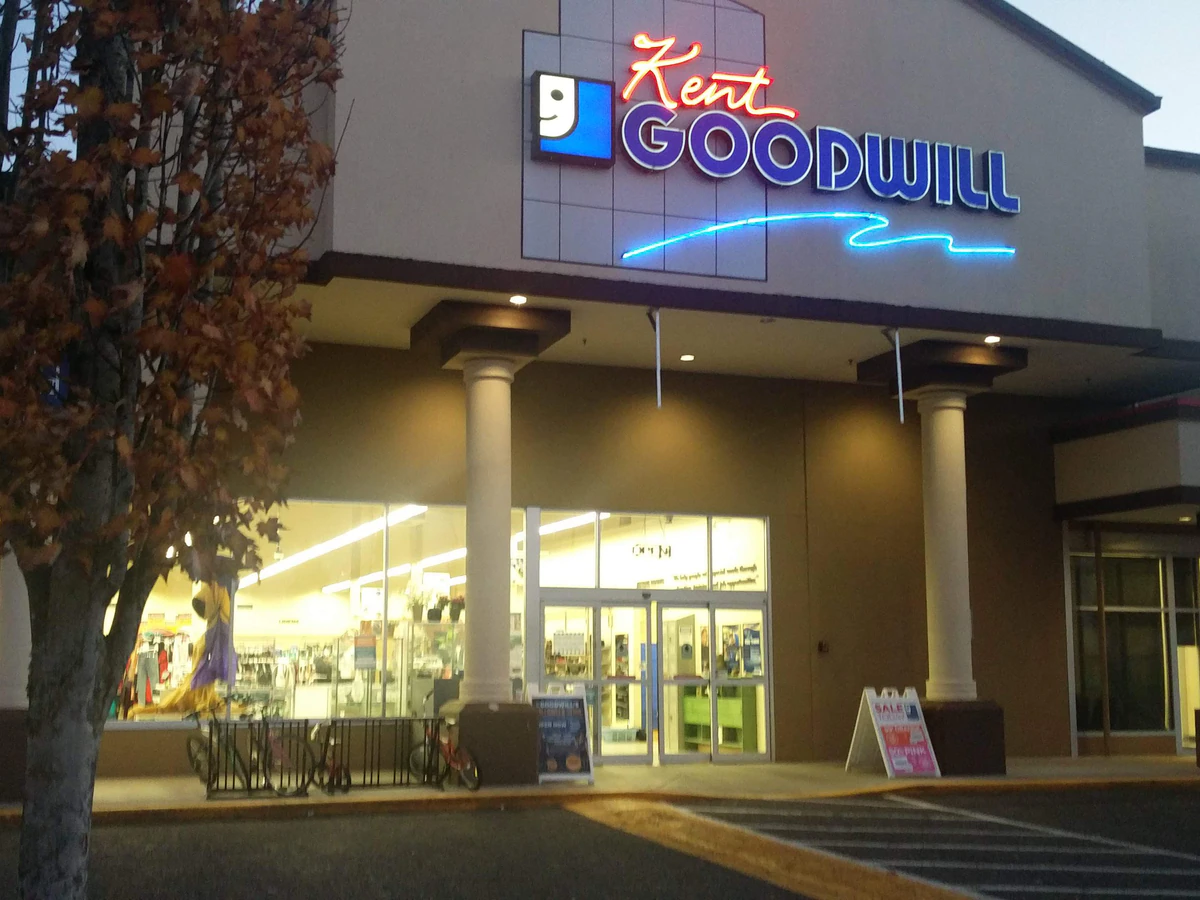Kent Goodwill in Kent, Washington, a Goodwill thrift store showing rows of affordable footwear and accessories for sale.