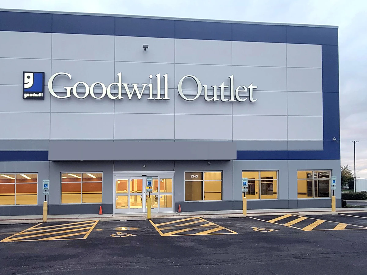 Romeoville Goodwill Outlet in Romeoville, Illinois, displaying a large open layout with rows of donation bins.