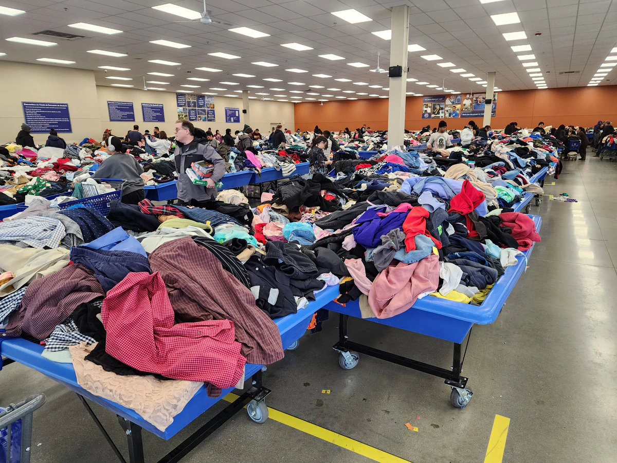 Romeoville Goodwill Outlet in Romeoville, Illinois, showing the donation entrance and bulk pricing signage.