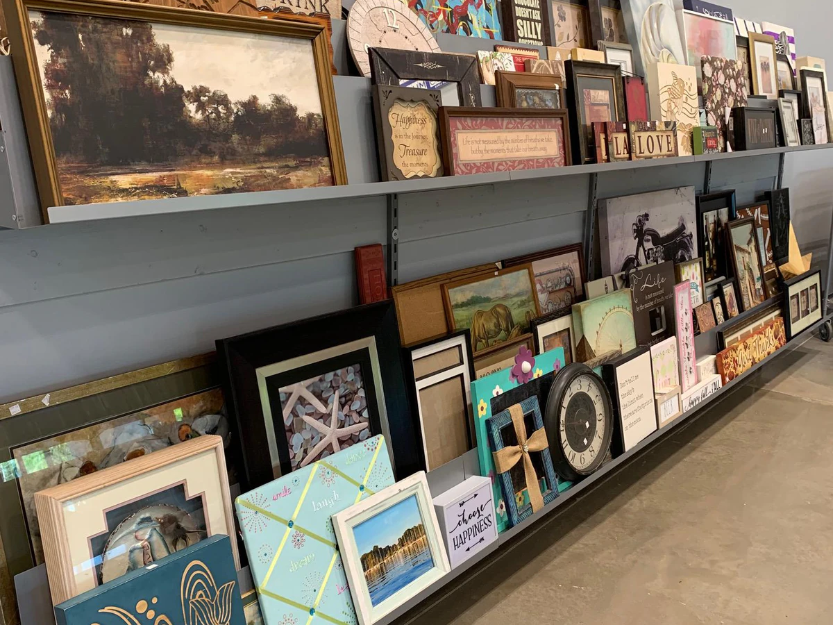 Second Editions - Rock Hill (Goodwill Outlet), a Goodwill outlet store highlighting organized racks of clothing near the che.