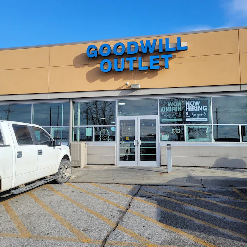The Goodwill Outlet in Omaha, Nebraska, a Goodwill outlet store displaying a large open layout with rows of donation bins.