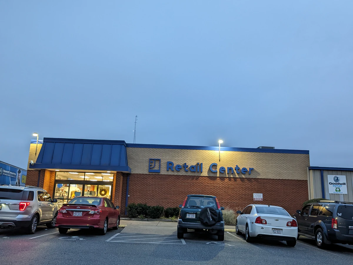 Triad Goodwill Store & Donation Center, a Goodwill thrift store showing neatly organized clothing racks and household goods..