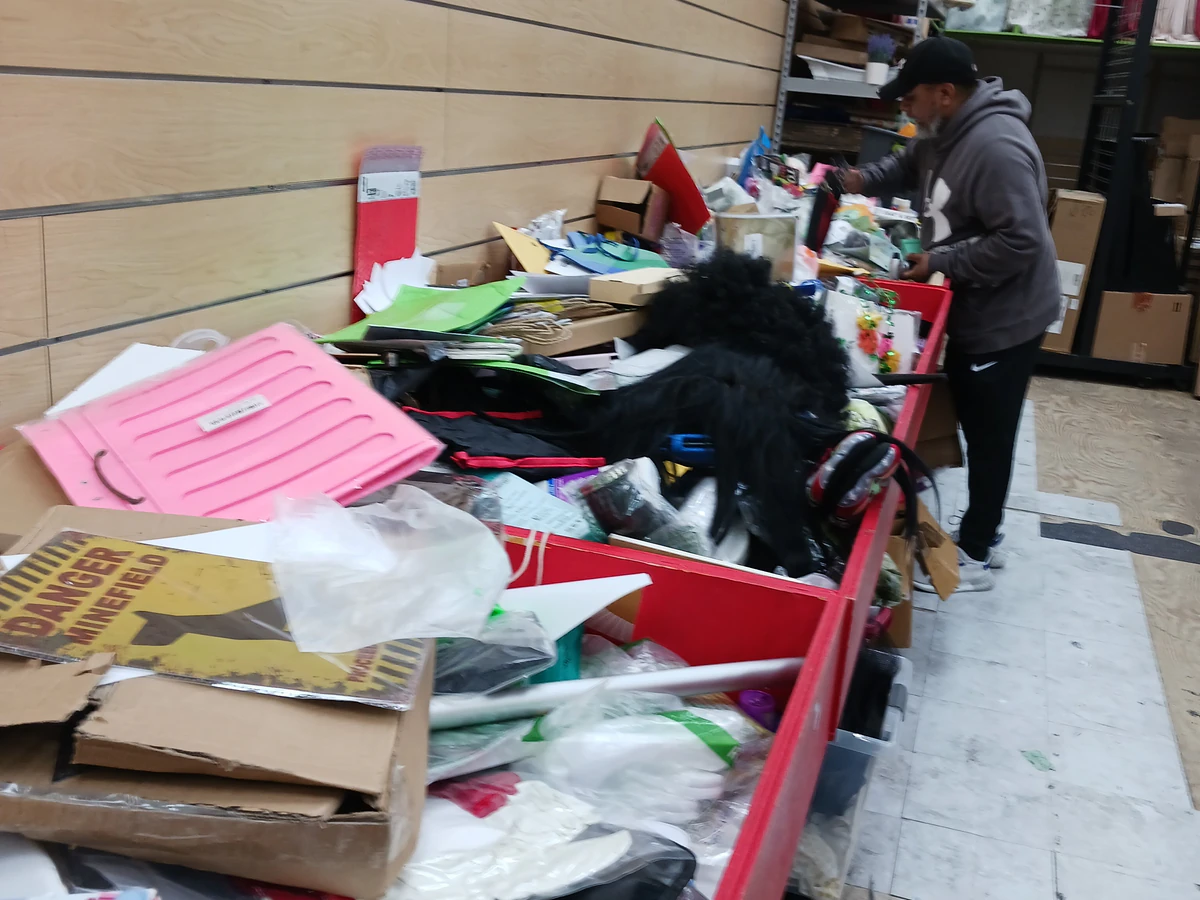 Amazing Saving Deals interior merchandise display - bin store in bronx, new york.