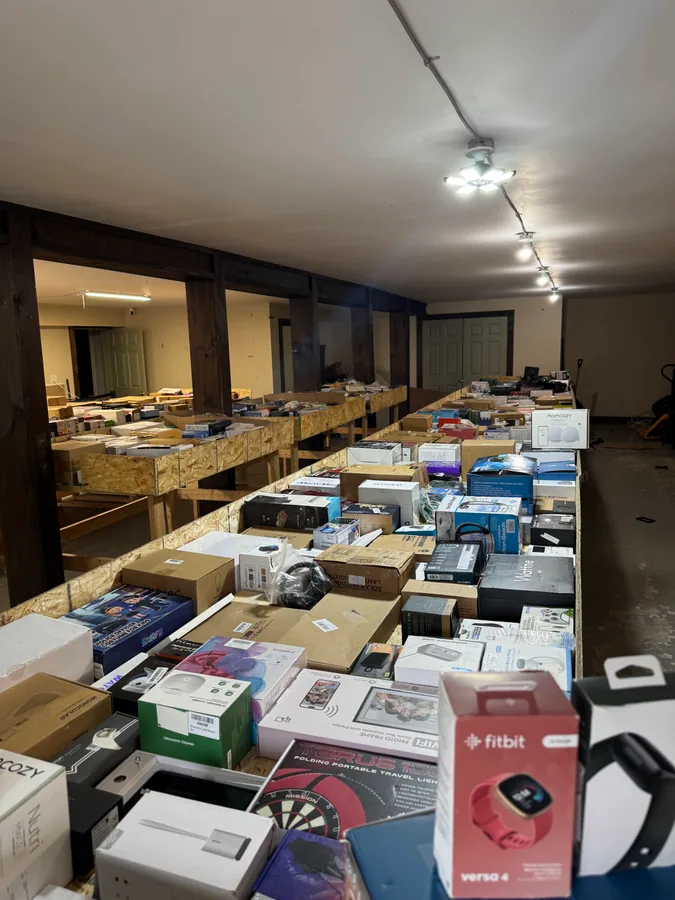 Inside Mad Binz Innisfil bin store in Lefroy, ON showing liquidation bins and bargain finds.